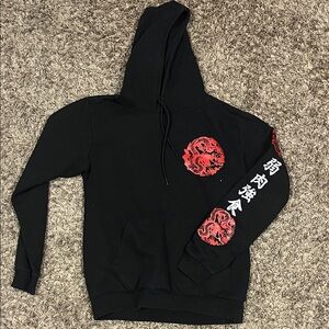 Men's Black Hoodie with Red Graphic Design
